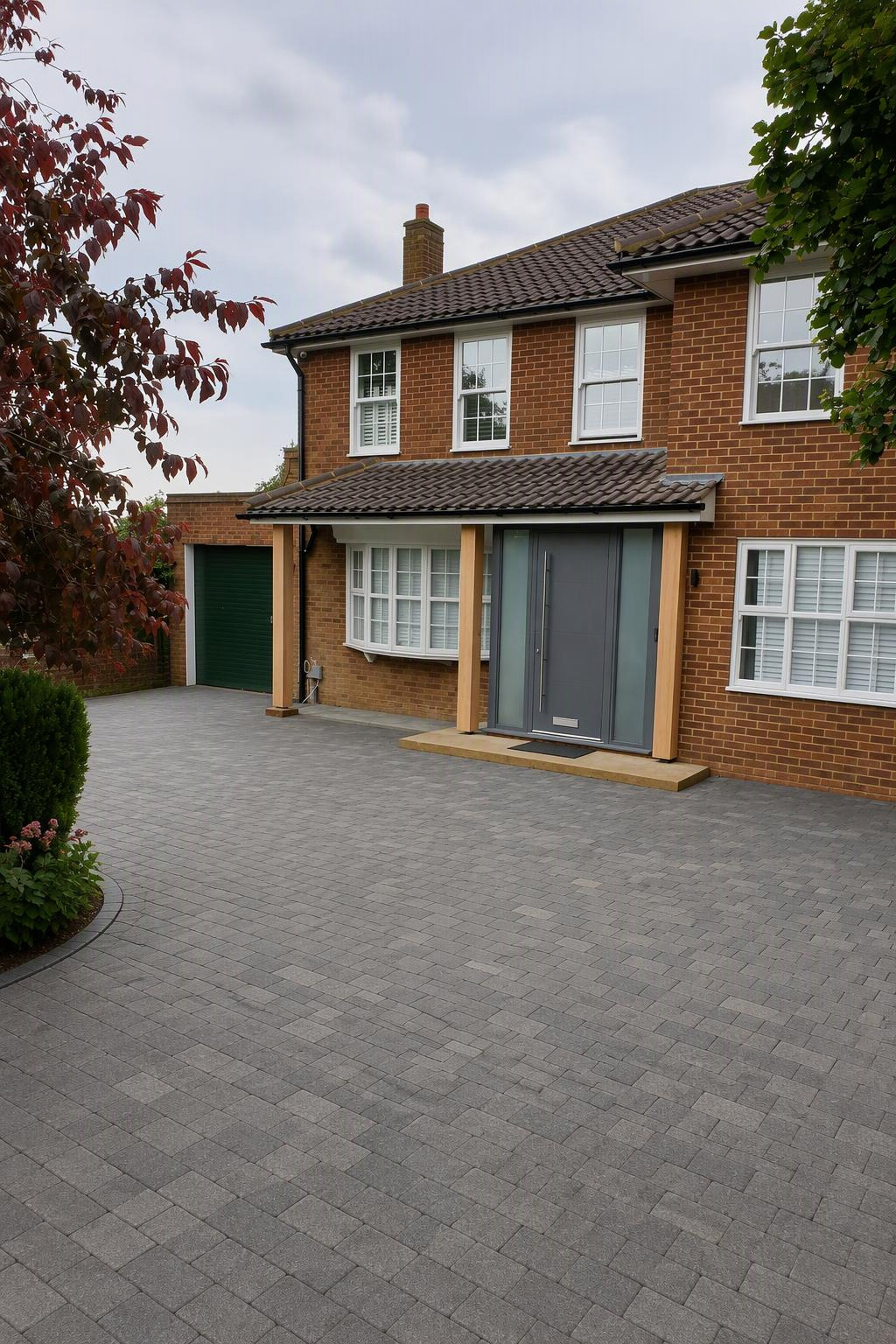 Front of the refurbished Epping house with new porch and paved driveway